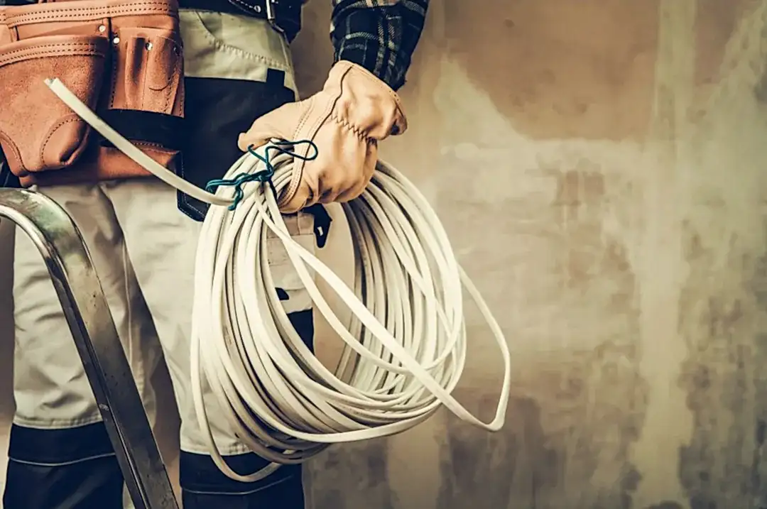 Why-You-Should-Hire-a-Licensed-Electrician Professional electrician performing residential electrical wiring services in Mount Vernon WA