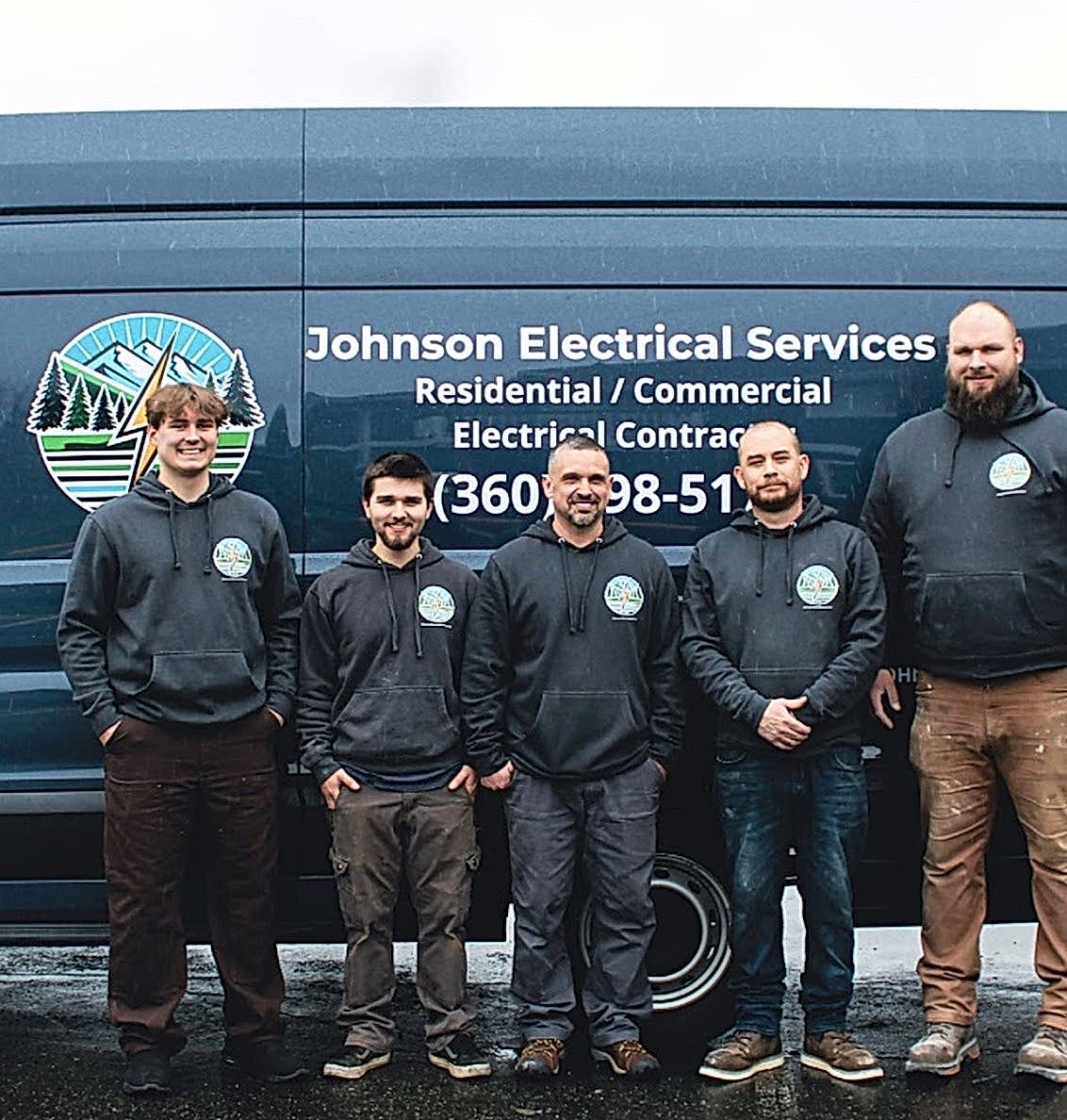 johnson-electrical-services-team-concrete-wa Johnson Electrical Services team standing in front of their service van in Concrete, WA.